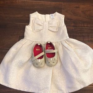 Carter’s dress and Carter’s unicorn shoes .